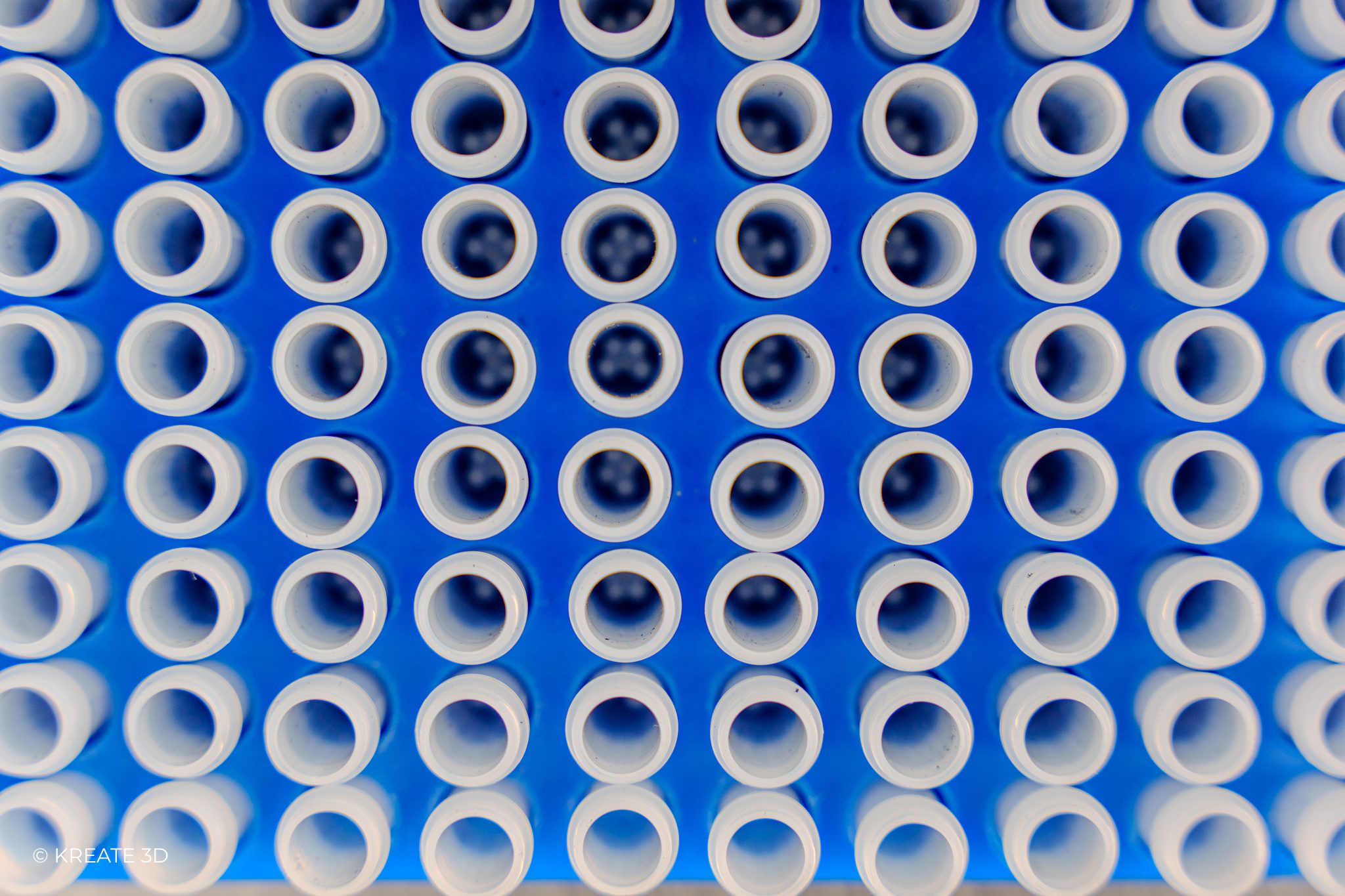 Ceramic beads in test tubes in a test tube tray